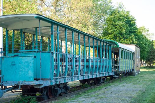 Old rusty tram. An old dilapidated tram at the dump. Tram the ghost. Destruction of old machinery.