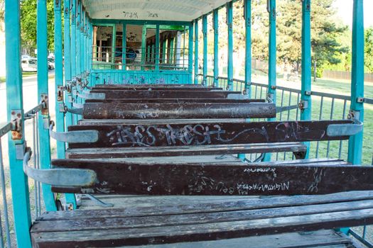 Inside old abandoned rusty wrecked tram