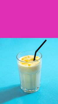 conceptual frame. A drink in neon. Milk milkshake lassi on a neon background. Lassi is a popular traditional cold drink in India with a base of dahi, yogurt.