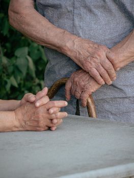 close up of wrinkled male old man on a sky pole