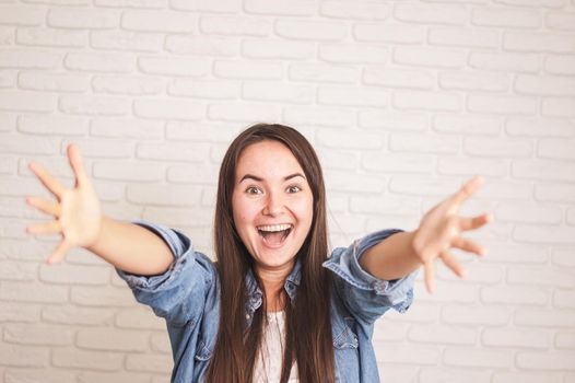 positive woman smiling on a light background. High quality photo