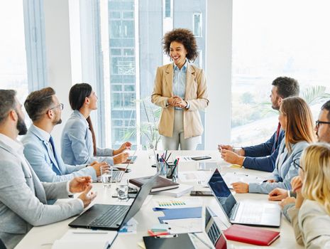 group of young business people having a meeting in the office