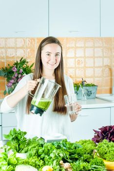 woman is going green healthy shake in blander for breakfast