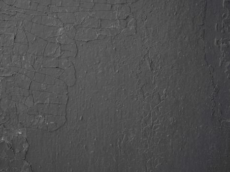 Space for text. Fragment of wall covered with old damaged gray plaster.