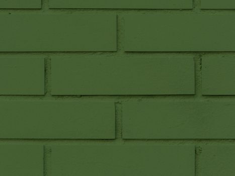 Front view brick wall texture background. Patinated and textured brick wall.