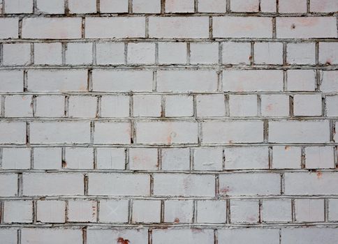 Weathered stained old brick wall. Copy space for design.