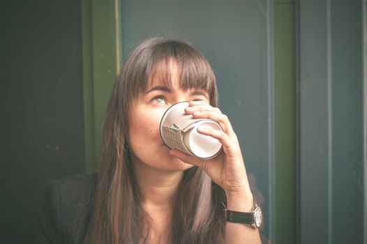 business woman drinking coffee. High quality photo