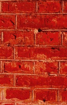 old brick wall texture background. A red brick wall in close-up.