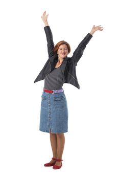 Full body shoot of happy redhead woman with arms raised, isolated on white background