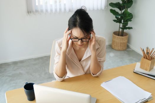 new normal, a businesswoman using computer to work for a company Via the internet on your desk at home.