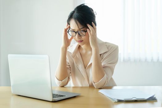 new normal, a businesswoman using computer to work for a company Via the internet on your desk at home.