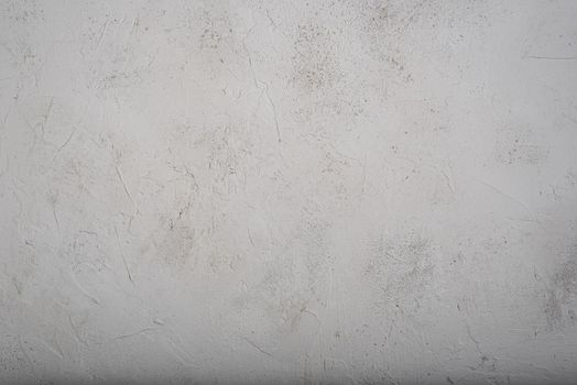 Gray textured concrete wall background. Copy space