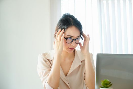 new normal, a businesswoman using computer to work for a company Via the internet on your desk at home.