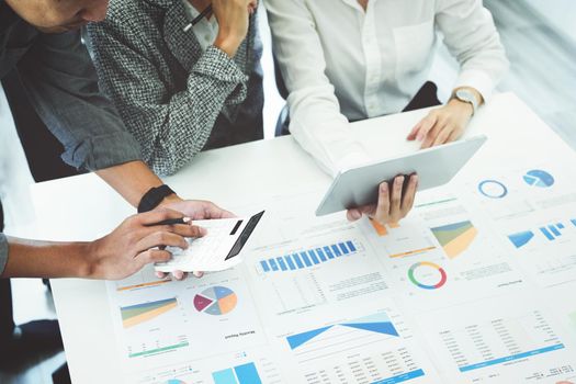 Planning to reduce investment risks, the image of a group of businesspeople working with partners is adjusting marketing strategies to analyze profitable and targeted customer needs at meetings.