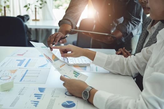 Planning to reduce investment risks, the image of a group of businesspeople working with partners is adjusting marketing strategies to analyze profitable and targeted customer needs at meetings.