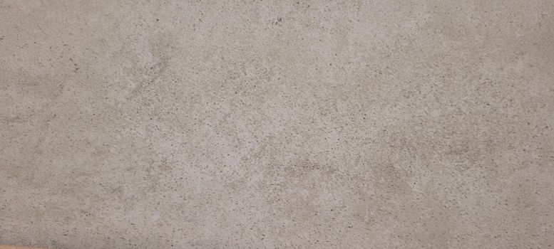 rustic dark background with abstract gray burnt cement floor texture on panel