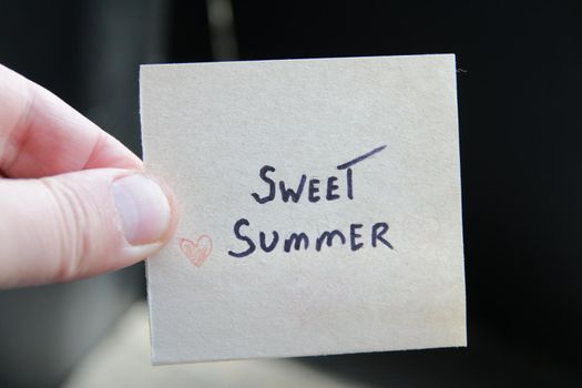 Sweet summer. Creative concept. A tag with the inscription.