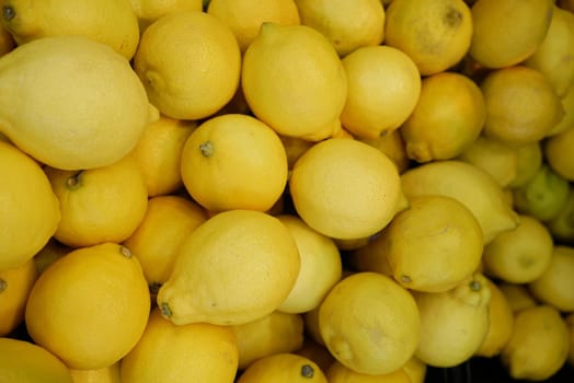 Yellow Lemon display for sale at local store top view ,