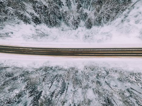 Winter snow road from above . Natural natural background. Copy Space