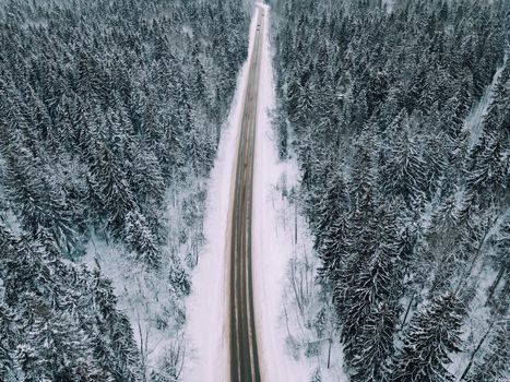 Winter snow road from above . Natural natural background. Copy Space