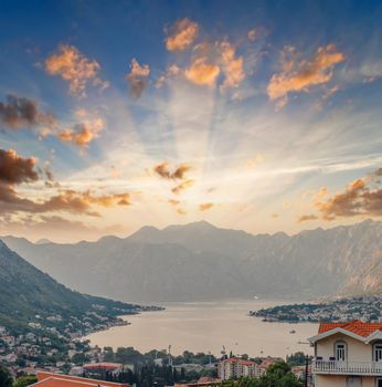 Sunset, beautiful landscape with silhouettes of trees. Travel concept. Montenegro, Kotor Bay. Sunset at Kotor Bay Montenegro. View of the sunset in Boko-Kotor Bay in Montenegro.