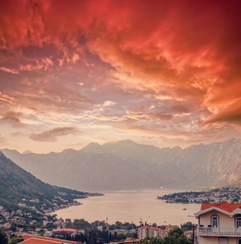 Sunset, beautiful landscape with silhouettes of trees. Travel concept. Montenegro, Kotor Bay. Sunset at Kotor Bay Montenegro. View of the sunset in Boko-Kotor Bay in Montenegro.