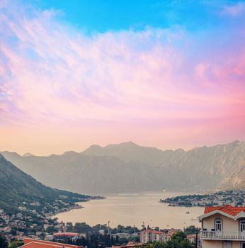 Sunset, beautiful landscape with silhouettes of trees. Travel concept. Montenegro, Kotor Bay. Sunset at Kotor Bay Montenegro. View of the sunset in Boko-Kotor Bay in Montenegro.