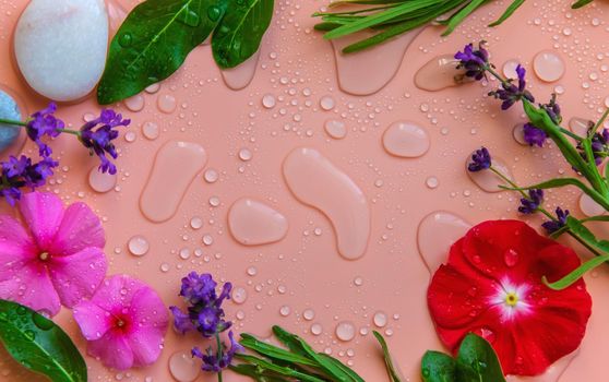 Background with water drops and flowers. Selective focus. Spa.