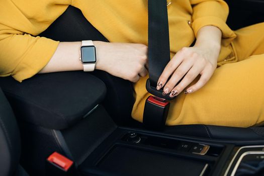 Buckle up seat belt in a car. Woman Hand Fastening Car Safety Seat Belt. Protection Road Safety Snap. Driver Fastening Seatbelt In Car. Woman Car Lap Buckling Inside Vehicle Before Driving.