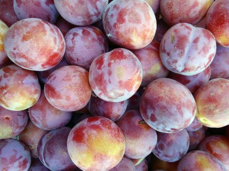 Bunch of White peaches at a farmers Market good for patterns and background.