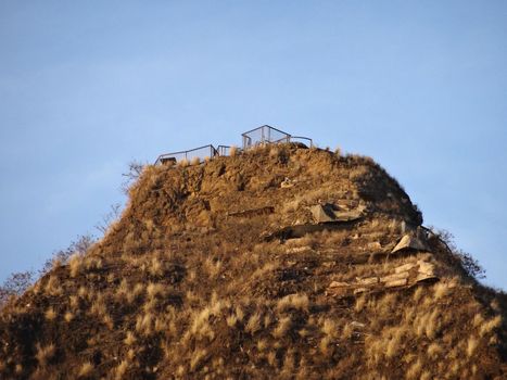 Empty Diamond Head Crater Lookout Peak with blue sky on Oahu, Hawaii.