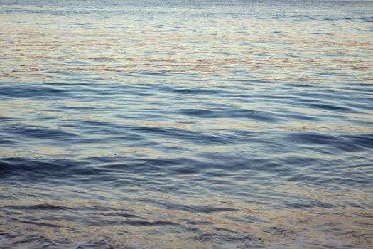 Ocean Water ripples off the coast of Oahu reflecting light.  Good for backgrounds textures.