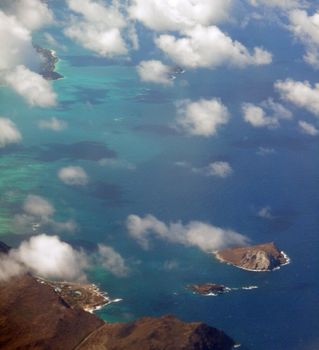 Aerial view of Rabbit and, Rock Islands, Makapuu, Sea Life Park, clouds and Pacific Ocean on Oahu, Hawaii.  On a spectacular day.