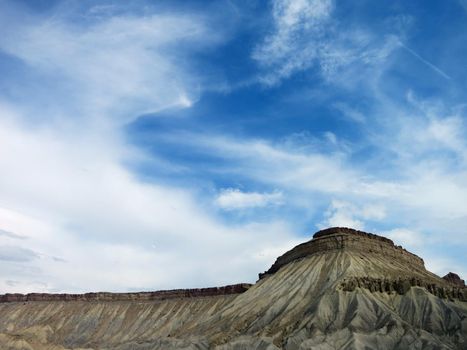 Colorado Rock Plateu revealing many layers and dramatic sky.