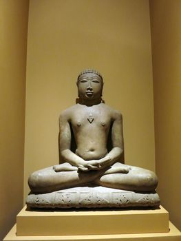 Malli, India, Madhya Pradesh, dated 1118.  Sitting in lotus position on stone Cushion.
