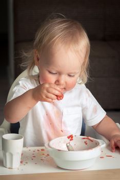 cute baby toddler learn to eat soup. High quality photo