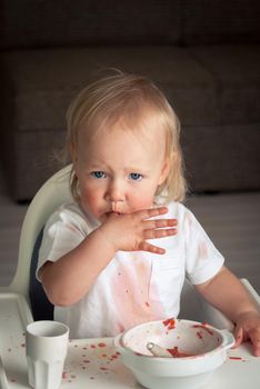 cute baby toddler learn to eat soup. High quality photo