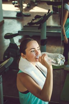 young woman training in the gym. High quality photo