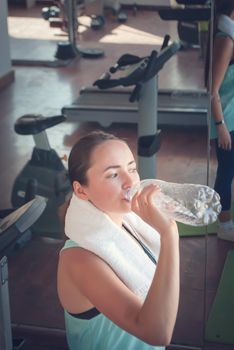 young woman training in the gym. High quality photo