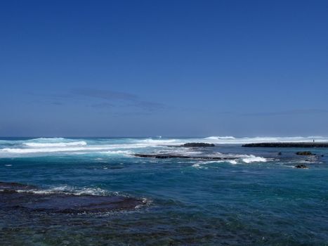 Waves roll into Kuilima Cove on the North Shore of Oahu, Hawaii.           