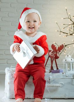 baby and Cristmas magic. High quality photo