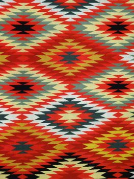 Pattern Red, Orange, White, Green, Black, and blue Diamond Blanket/ Rug - Navajo Artist, made about 1885 of cotton and wool.                              