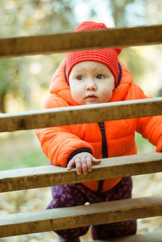 the child climbs the steps on the playground. High quality photo