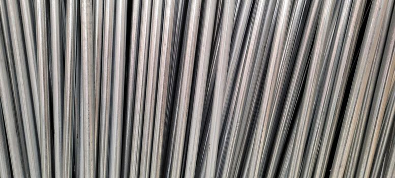 metallic background of aluminum tubes in stock of a work in Brazil