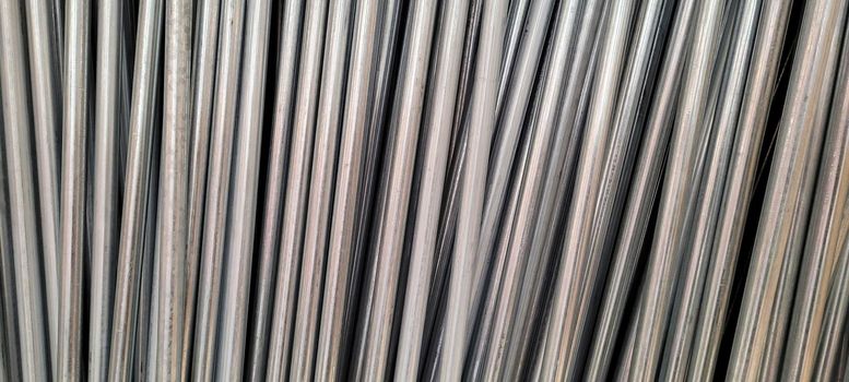 metallic background of aluminum tubes in stock of a work in Brazil