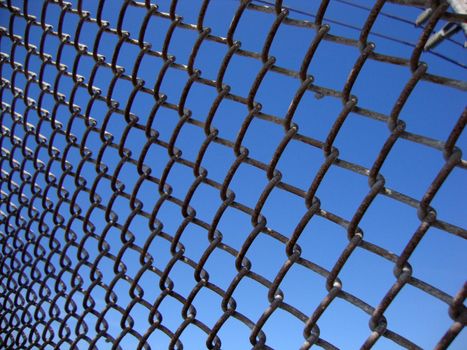 Texture the cage metal net at angle with powerlines.