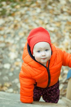 the child climbs the steps on the playground. High quality photo