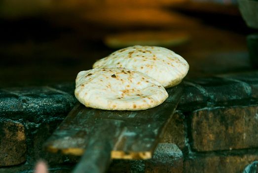 . Preparation of tradition arabic bread. High quality photo