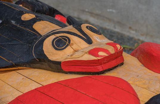 Sitka, AK - 8 June 2022: Totem poles displayed in the Sitka National Historical park in Alaska