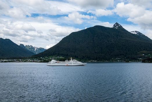 Sitka, AK - 8 June 2022: Windstar Star Breeze cruise ship anchored in Sitka bay in Alaska